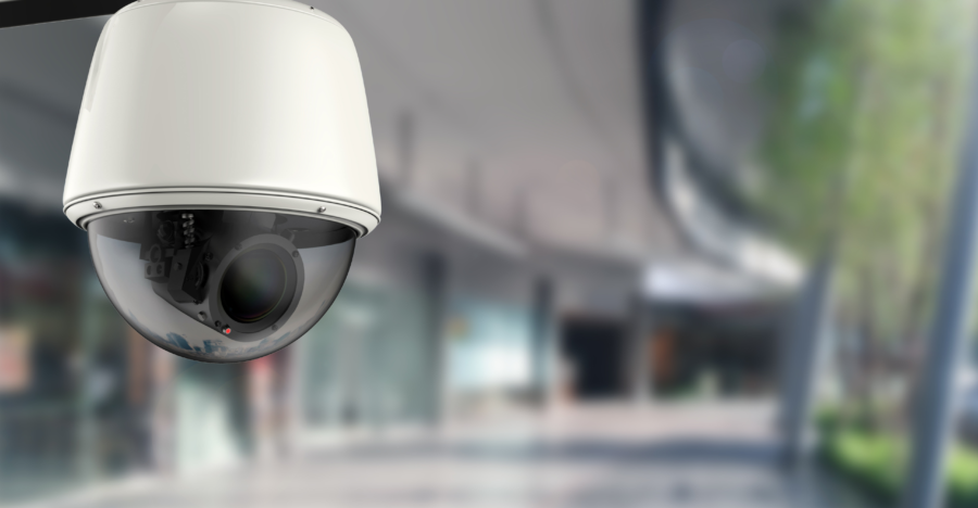 Expert Security Camera Installation for Homes and Businesses in Toronto Professional security camera installer setting up outdoor surveillance system