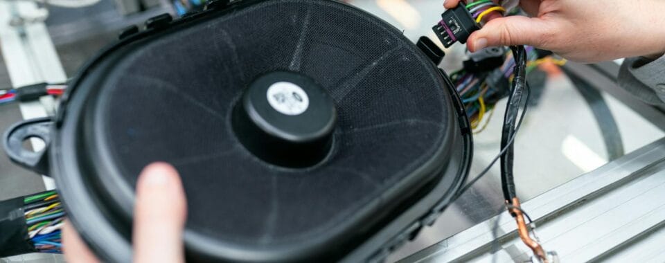 Audio system installation with modern speakers and soundbar setup in a home theater