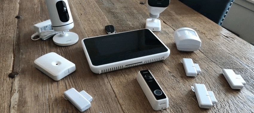 Smart home alarm system control panel in a modern house